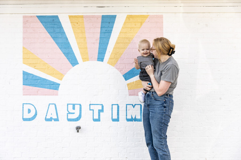 A mom and son cheesing outside of Daytime Diner in Ames, Iowa.