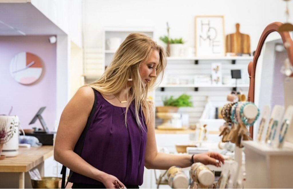 A local browsing the selection at a downtown Ames store.