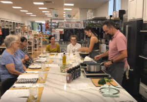 A cooking class in session at Cooks Emporium.