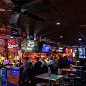 patrons at bar at Welch Ave. Station in Ames