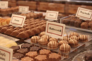 Chocolate candies on display. Butterscotch and cream filled chocolates.